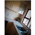 Kitchen in Etimo & Commet Gloss Tops